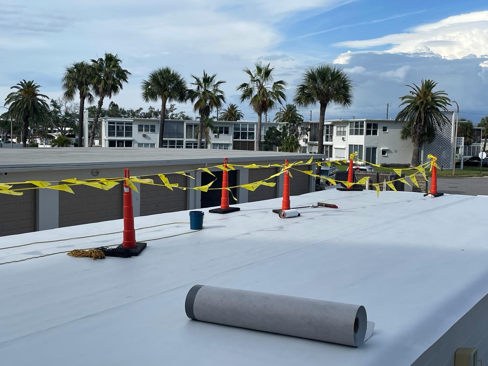 GQC team working on commercial flat roof installation