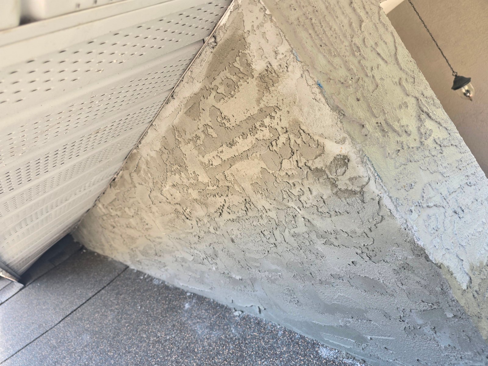 Roof-to-Wall Stucco Patch & Flashing Tie-In
